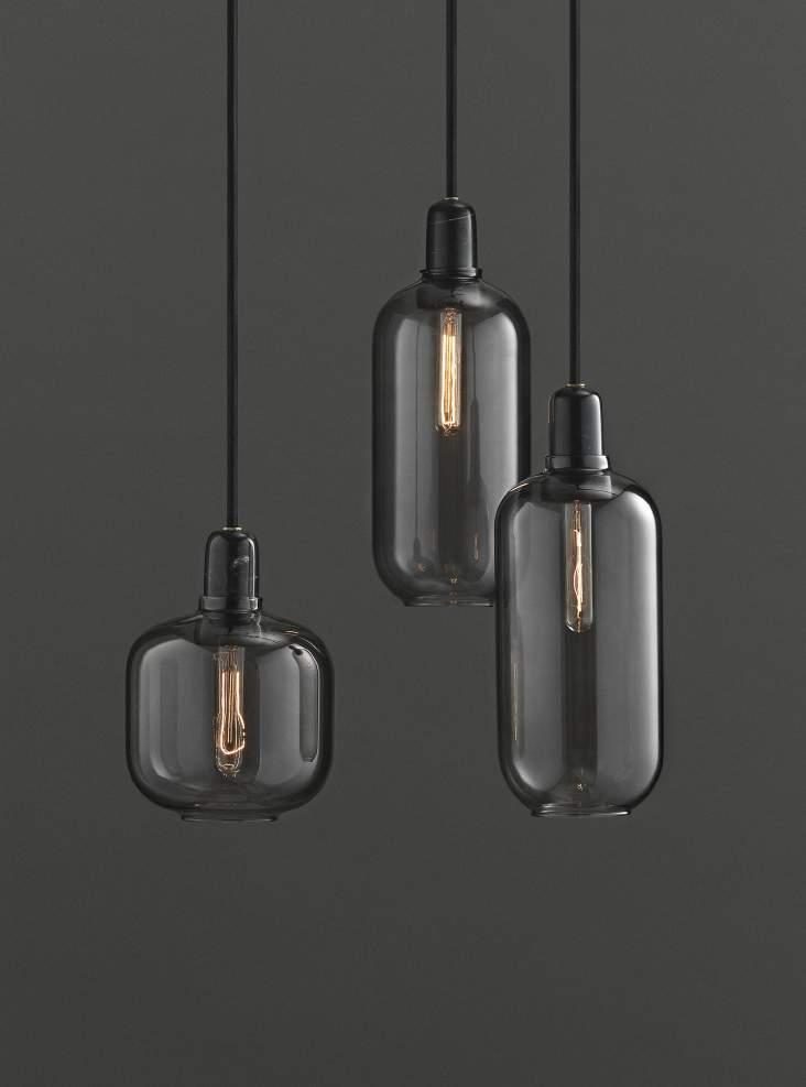 AMP PENDANT Simon Legald has designed a sophisticated range of lamps called Amp. The idea for the lamps came to him when he was restoring an old 1960 s radio at home.