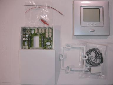 A07686 Fig. 3 - TP -NRH -A Carton Contents 1. Display Module 2. Stand -off for Equipment Control Module 3. Outside Air Temperature Sensor, screws and pigtail. 4.