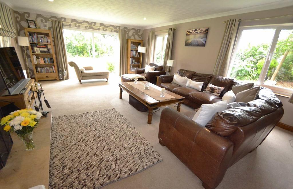 Peenemunde, Houmet Lane, Vale Peenemunde is a spacious beautifully refurbished chalet bungalow with a large conservatory, double garage with storage above, detached beauty salon with shower room,