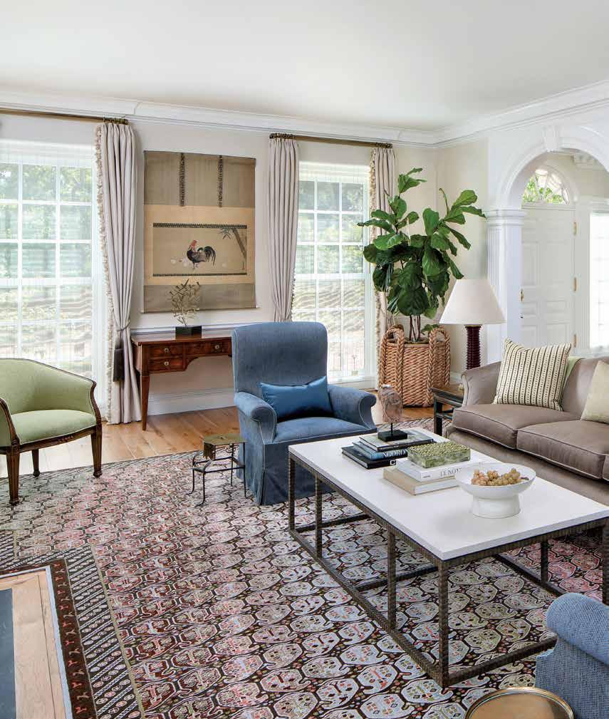 Designer Dara Rosenfeld kept the furnishings streamlined and sophisticated in the living room,
