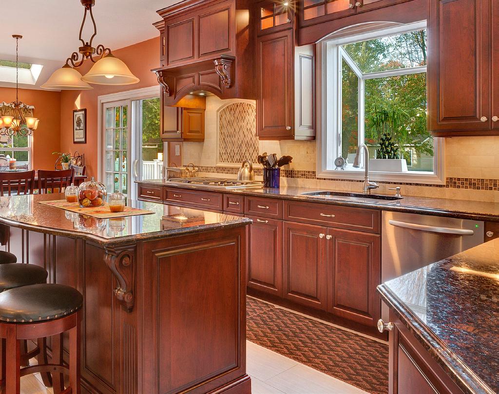 TRADITIONAL CHOOSE YOUR style TRADITIONAL The time-honored traditional kitchen has more decorative features such as corbels, crown moldings and inlaid