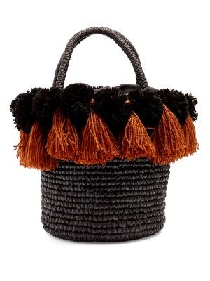 Pompom-embellished toquilla-straw basket bag 325 Angela raffia-embellished leather sandals 290 Resident head chef Mark Mabon is as passionate about foraging and sourcing local, ethical and