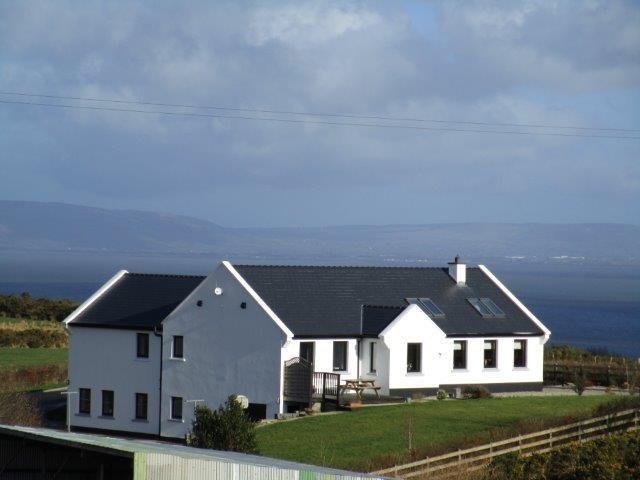 Gortin, Ture, Muff, Co Donegal Price 275,000 (BER B2) SPECTACULAR HIGH QUALITY SPLIT LEVEL HOUSE WITH GEOTHERMAL HEATING ON SCENIC 0.75 ACRE SITE OVERLOOKING LOUGH FOYLE.