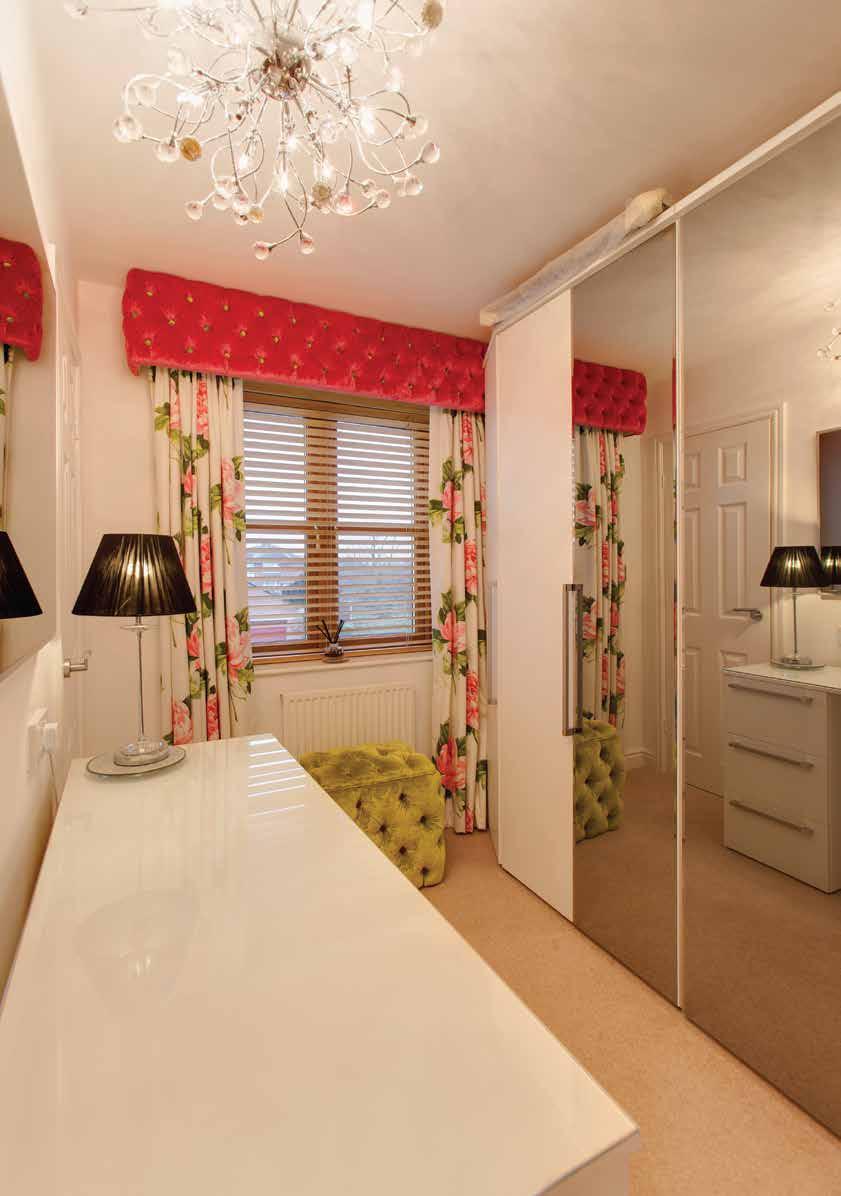 ceiling rose, central heating radiator and two fitted storage cupboards providing short and long hanging.