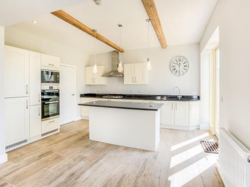 From the moment you step into the hallway this property oozes grandeur with the retained character features including the exposed solid wood beams throughout, high ceilings and split level staircase
