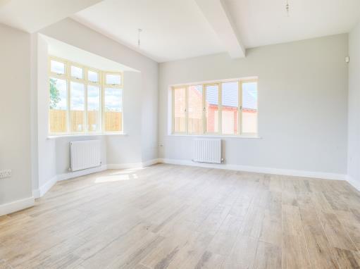 A very large Master Bedroom with double glazed windows to front and side elevations. With a radiator, multiple plug sockets, USB ports, telephone and television points.
