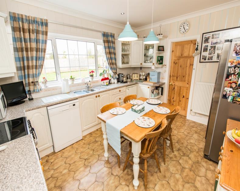 This substantial home provides excellent living space with the special benefit of a large and lovely level sunny rear garden, backing onto countryside and commanding a good level of privacy, the