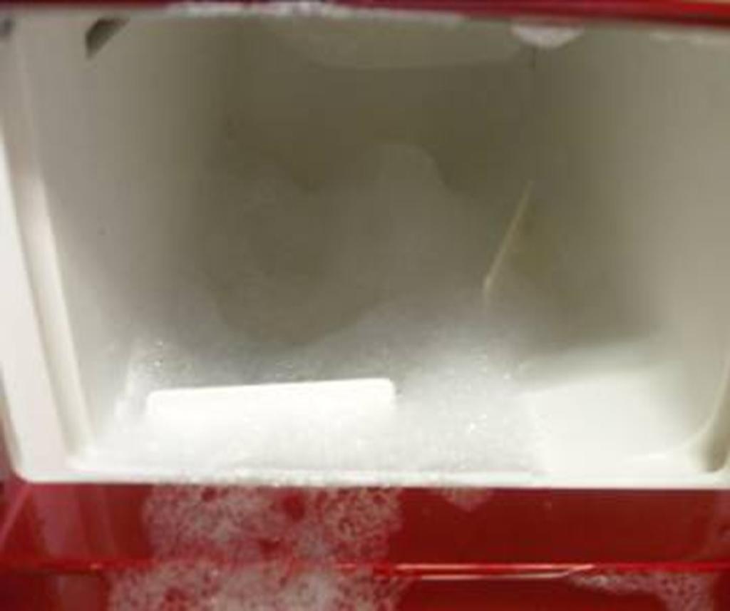 It is normal for a small amount of water remaining in Detergent Drawer after it completes washing. Bleach is usually flushed out into the tub at the beginning of the washing.