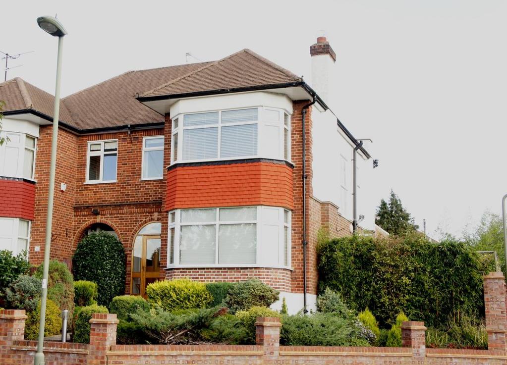 Norrys Road Cockfosters Barnet EN4 9JX This most attractive three bedroom halls-adjoining semi-detached family house occupies an elevated corner plot with PLANNING PERMISSION GRANTED for a double