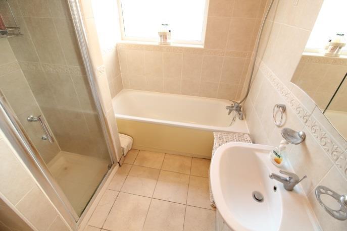 FAMILY BATHROOM - double glazed window to rear and side, panelled bath, shower cubicle, wash hand