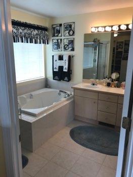 1. Room Master Bathroom Ceiling and walls are in good condition overall. Accessible outlets operate. Light fixture operates.