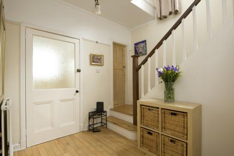 The Property Comprises: COVERED ENTRANCE PORCH: Outside light.