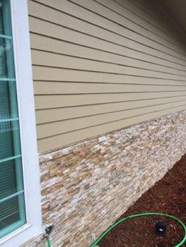 1. Siding Condition Exterior Areas Siding appeared in good condition overall. Cement fiberboard siding. Wood siding. Stone siding material. 2.