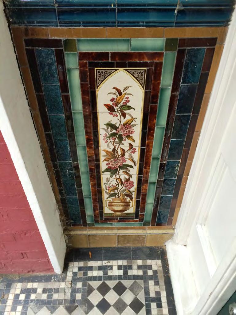 Tiled porch in London with printed tiles by
