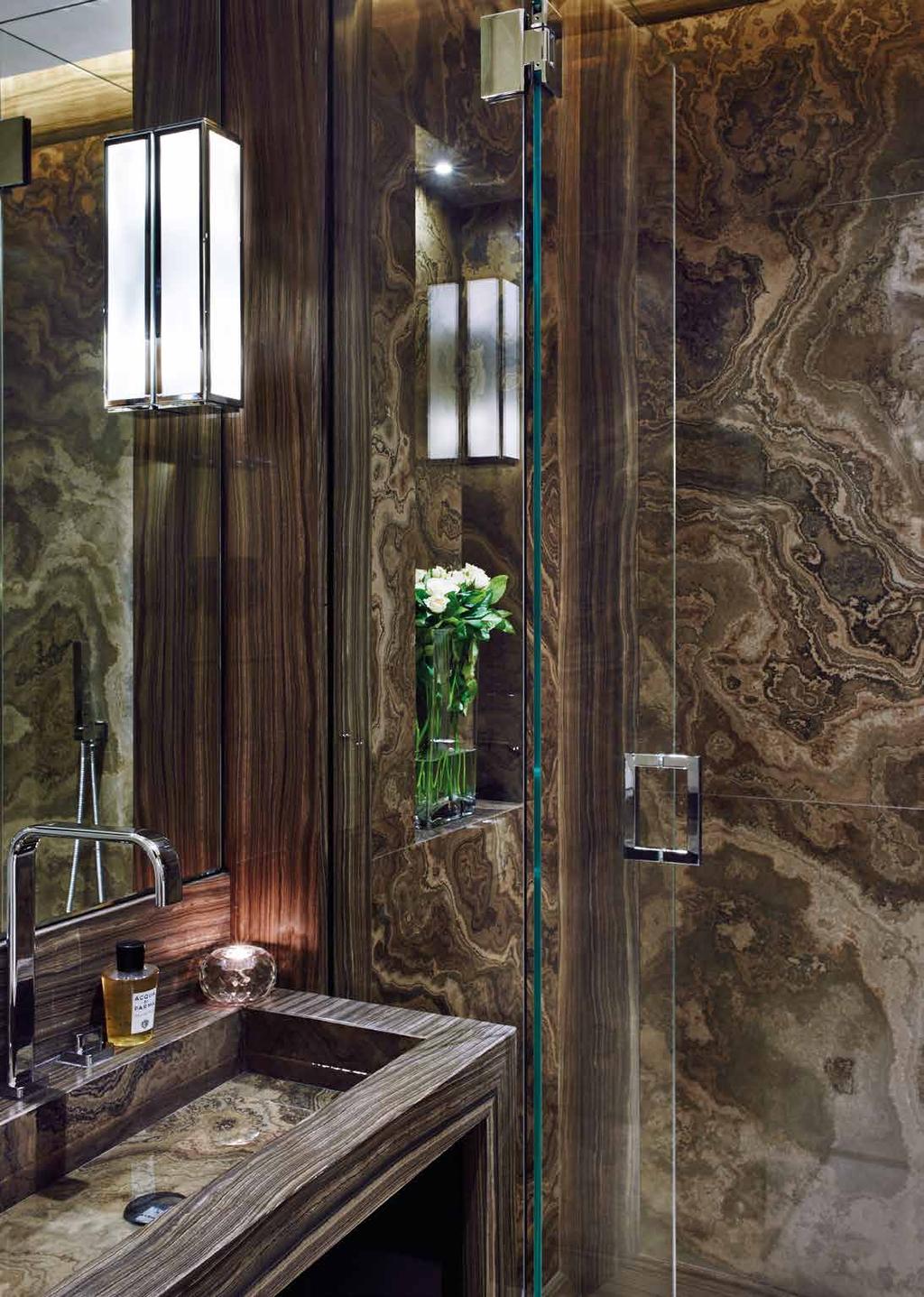 BATHROOMS STONE CARVED Marble and Onyx were chosen to