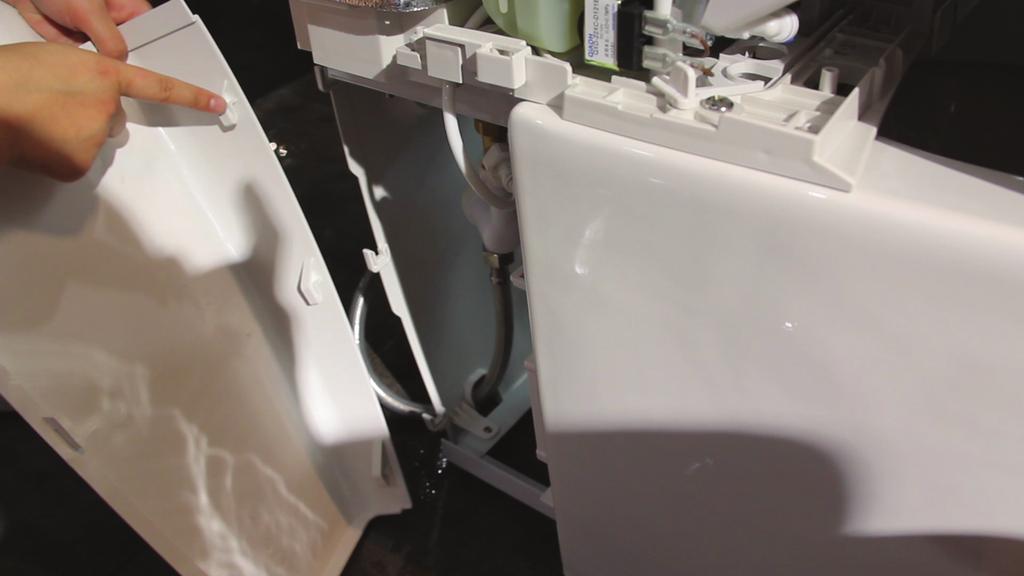 TIPS FOR RE-INSTALLING SIDE PANELS A Start by aligning the 3 pegs on the back of the side panel with the 3 corresponding brackets on the back of the toilet.