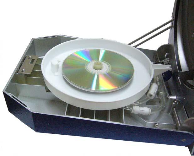 5.4 Setting a disc for repair: 1. Properly place disc on Platen Table. CAUTION! Make sure that the side to be repaired is facing up. CAUTION! Improperly placing a disc (with the label up) can result in damage to disc & pads.