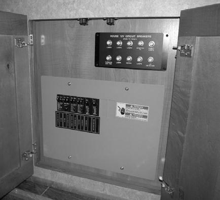 SECTION 6 ELECTRICAL 120-Volt House Circuit Breakers Power Center -Typical View Certain circuits, however, remain unchanged for use by items which require 120-volt current, such as the air
