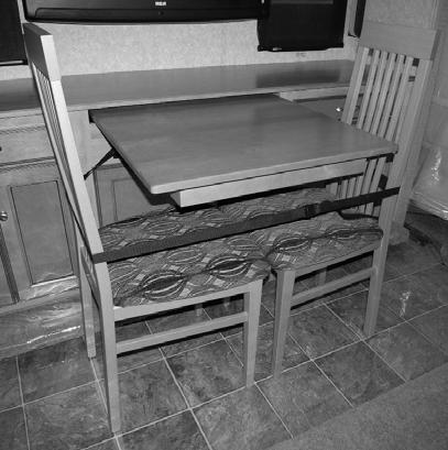 Bind chairs together with the provided strap, ensuring the strap goes through the ring located om the bottom side of the