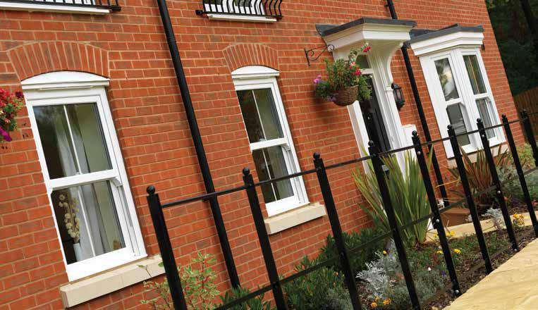 Discover a design classic with a modern twist With charisma vertical sliding sash windows from Eurocell White charisma vertical sliding sash windows fitted onto new build property with single