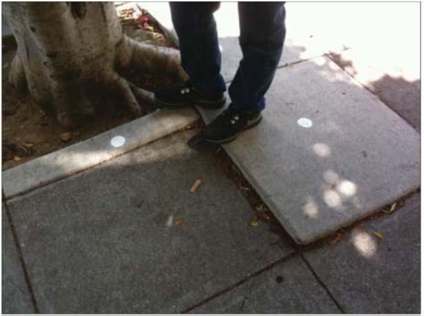 areas of distressed sidewalks; and, adjacent