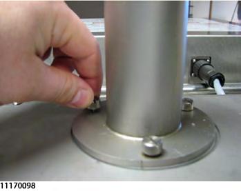 1. Loosen the 3 thumb screws that secure the steam stack to the top of the fryer. 2.