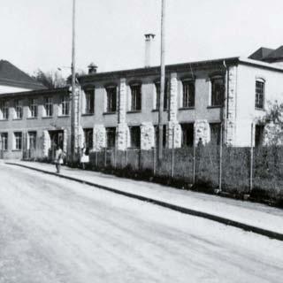 From the company history: the first factory