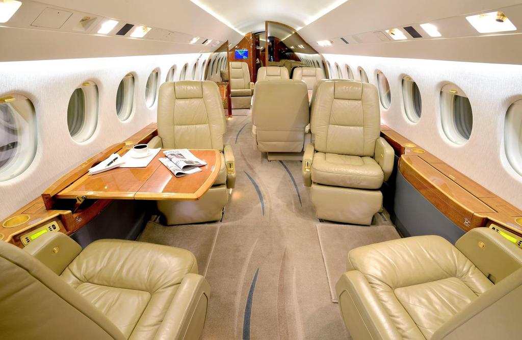 INTERIOR Forward Cabin INTERIOR DESCRIPTION (Original interior completed in September 2005 at Dassault Falcon Jet, Little Rock, AR) This beautifully appointed 12 passenger executive floor plan