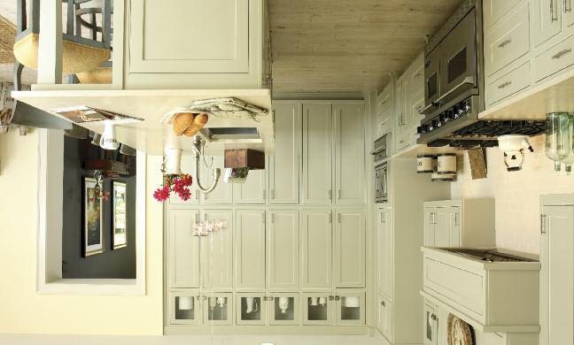 To create interest to the custom kitchen cabinetry, Hirsch added a white accent to the
