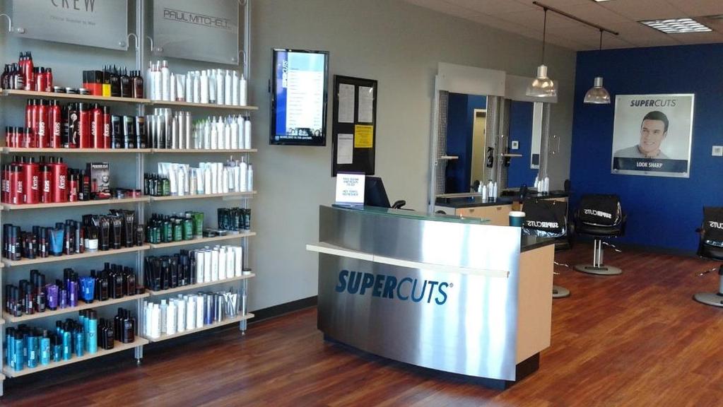 Front Desk Area A clean, front desk area showing the menu board and other branded information reminds guests that they are at a Supercuts salon, and contributes to the Supercuts brand experience.