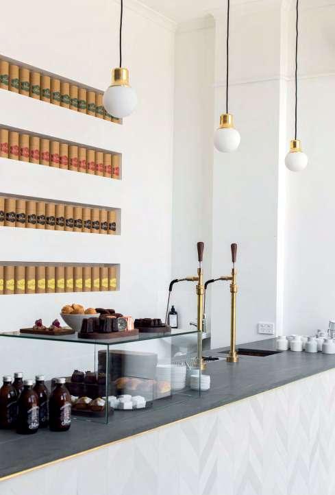 A 1950s bakery warehouse in North Melbourne has been converted into an 18-seat concept store with a chocolate brew bar in the centre.