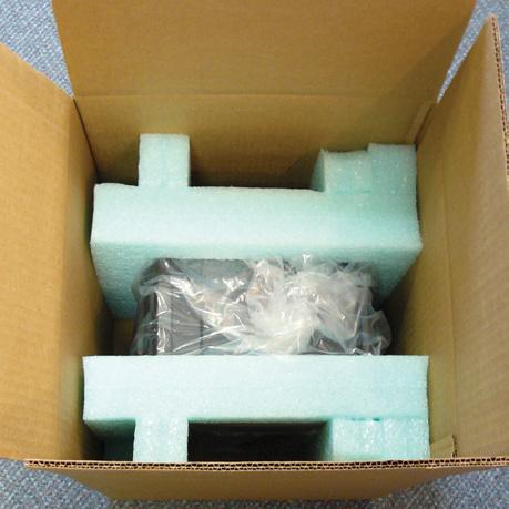 Place the VMI Hybrid that has been encased within the foams and protective plastic bag into the Shipping Box. 11.