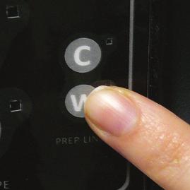 Locate the two smaller buttons, labeled C & W, on the front User Keypad. C = Buffing Solution & W = Water. To activate the prepping process, press either the C or the W button.