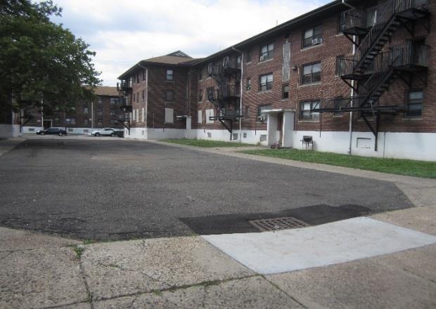 There are several other paved areas on this site that could be depaved, and some of these areas can be converted into rain gardens to capture runoff from the rooftops.
