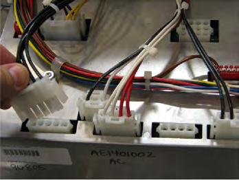 Use a 3/8 inch nut-driver or socket and reconnect the nut securing the ground wire to the control board. 8.