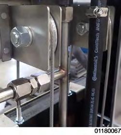Using a 3/8 nut driver, remove the nuts securing rear shroud of the fryer and remove the shroud. 2. Using a Phillips screwdriver, remove screws securing the top cap and remove. 3. Lower the lid until it latches, and then insert two 5/16 carriage bolts, one through each side of the weight carriage and in to the frame to secure the carriage.
