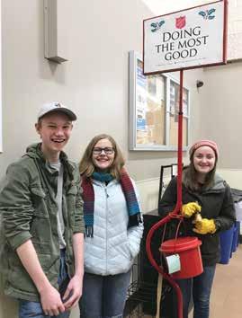 Right: Nick and Tim followed in their older brother Matt s footsteps to raise money for the Salvation Army at Festival Foods on Birch Street.