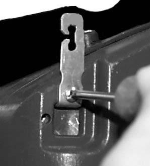 Unlatch the door, using the 2 latches to open and remove by sliding it out of its hinge.