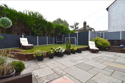 A fine feature of this superb property is the meticulously maintained rear garden which has a wide slate paved sun terrace being directly behind and wrapping itself around to the sides.