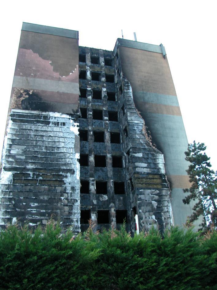 The façade was an EIFS system with EPS insulation and mineral wool fire barriers. Figure 5.