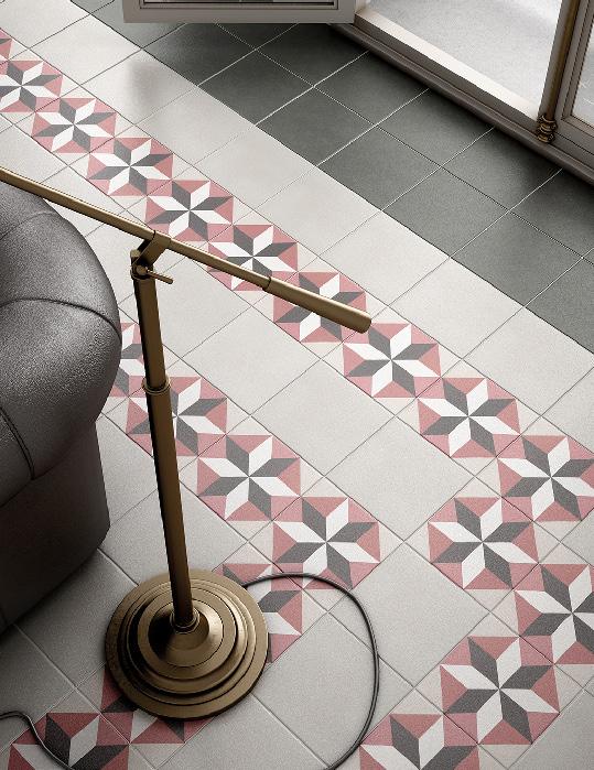 If you re looking to introduce pattern in a more minimalist way, consider creating a border feature around the outside of a room using complementary plain coloured tiles to co-ordinate.