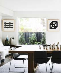 H&G HOUSES DINING / The dining table also performs as an art and craft workspace for this creative family. Dining table, Mark Tuckey. Dining chairs, Poliform. Banquette and cushions, Jardan.