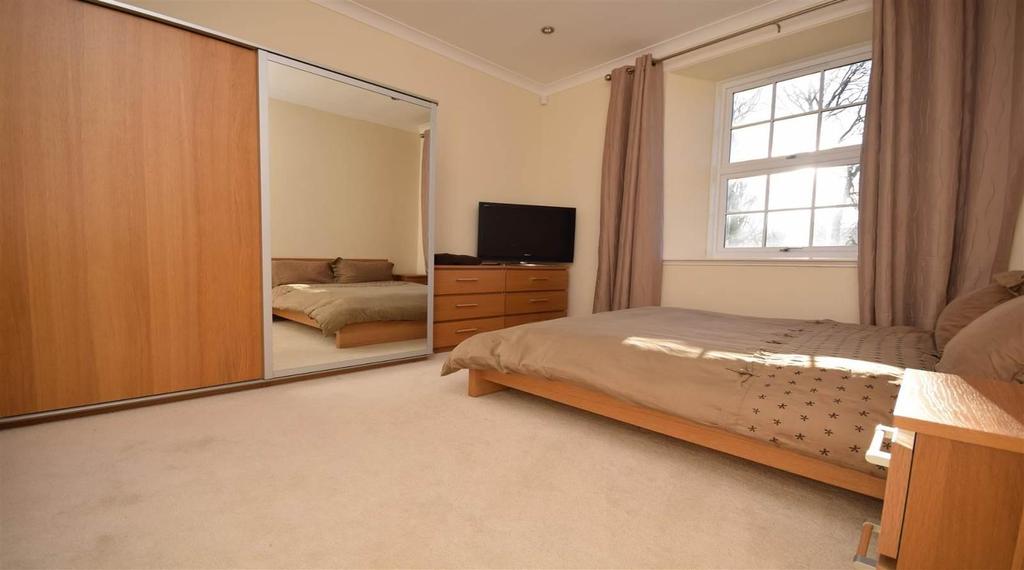 Bedroom 1 3.84m x 3.61m (12'7" x 11'10") A spacious double bedroom with window to the rear. Radiator. Carpet. LED dimmer switch lighting. En-suite 3.35m x 2.