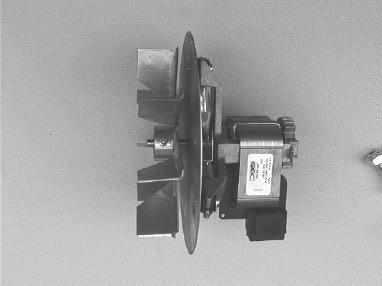 FIGURE 13- Fan Blade Position on the Motor Shaft 3. Remove the fan assembly (fan guard, motor and fan blade). 4. Disassemble and replace parts as needed, then reassemble.