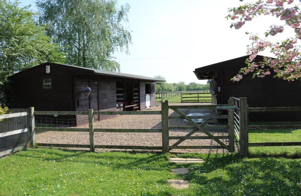 Stable Block The stabling is divided into two separate professional equestrian buildings, one with three stables, of approximate measurement 12 x 12 (3.65 x 3.