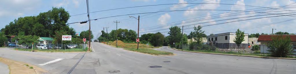 Urban Neighborhood Photograph looking north at th Ave + nd Ave split. Nolensville Pike diverges at the point where th Ave. S. and nd Ave. S. meet, creating two one-way thoroughfares.