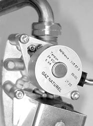 Gas control valve stepper motor Before starting refer to the front of Section Important information. Remove the front panel. Lower the control panel.