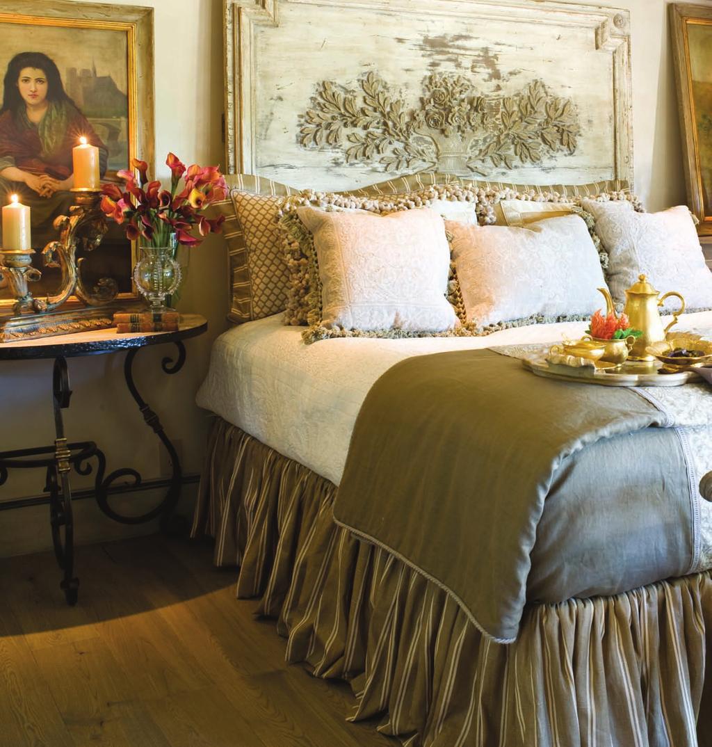For his bedroom the designer used soothing hues of tan and blues. Bedding is custom from Linen Trees and the fabrics are Kerry Joyce Textiles.