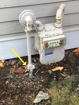 Gas Condition Meter located at west side. Main Gas shutoff is located to the lower left of the meter.