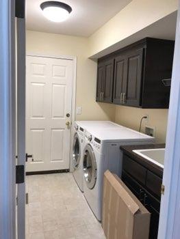 1. Location 1st Floor Laundry 2. Condition Ceiling and walls are in good condition overall. Accessible outlets operate. Light fixture operates. 3.